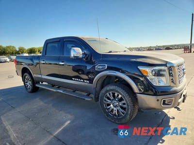 Czwarte zdjęcie samochodu z boku: 2017 NISSAN TITAN XD PLATINUM RESERVE VIN:1N6AA1F41HN507860 - miniatura