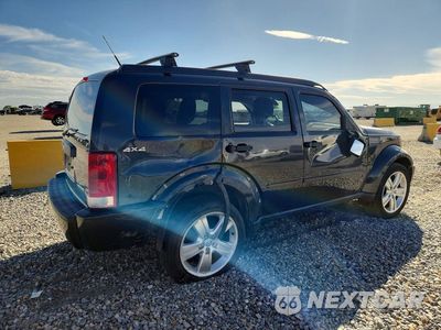 Trzecie zdjęcie samochodu z tyłu: 2011 DODGE NITRO HEAT VIN:1D4PU4GK0BW522812 - miniatura