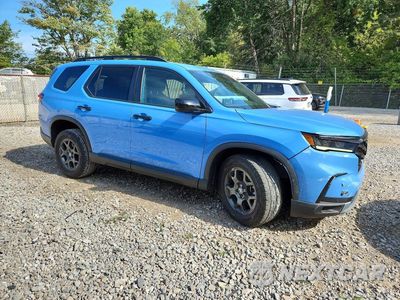 Czwarte zdjęcie samochodu z boku: 2024 HONDA PILOT TRAILSPORT VIN:5FNYG1H60RB013598 - miniatura