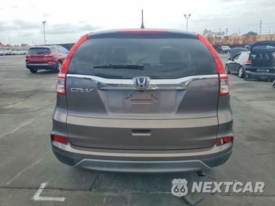 Zdjęcie 6 z 12 samochodu: 2015 HONDA CR-V LX VIN:3CZRM3H39FG709813 - miniatura