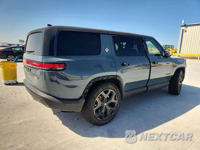 Trzecie zdjęcie samochodu z tyłu: 2026 RIVIAN R1S PREMIUM VIN:7PDSGBBP6TN080883 - miniatura
