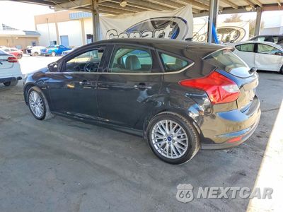 Drugie zdjęcie samochodu z przodu: 2013 FORD FOCUS TITANIUM VIN:1FADP3N20DL382596 - miniatura