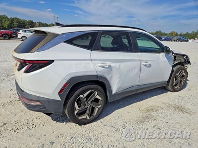 Trzecie zdjęcie samochodu z tyłu: 2022 HYUNDAI TUCSON SEL VIN:5NMJC3AE0NH060410 - miniatura
