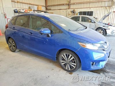 Czwarte zdjęcie samochodu z boku: 2015 HONDA FIT EX VIN:3HGGK5H82FM710119 - miniatura