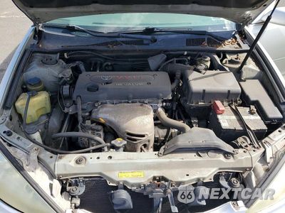 Zdjęcie 11 z 13 samochodu: 2003 TOYOTA CAMRY LE VIN:JTDBE32K130170897 - miniatura