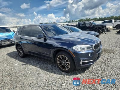Czwarte zdjęcie samochodu z boku: 2017 BMW X5 XDR40E VIN:5UXKT0C31H0V97272 - miniatura