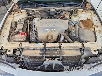 Zdjęcie 11 z 12 samochodu: 2000 BUICK PARK AVENUE VIN:1G4CW54K5Y4280051 - miniatura
