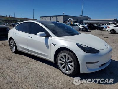 Czwarte zdjęcie samochodu z boku: 2021 TESLA MODEL 3 VIN:5YJ3E1EA4MF978725 - miniatura