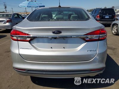 Zdjęcie 6 z 12 samochodu: 2018 FORD FUSION S HYBRID VIN:3FA6P0UU7JR273575 - miniatura