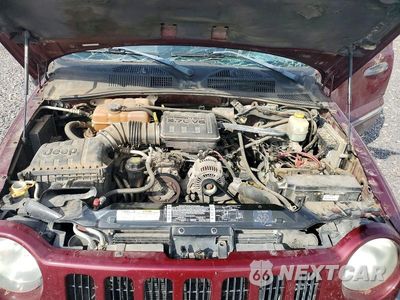 Zdjęcie 12 z 13 samochodu: 2003 JEEP LIBERTY SPORT VIN:1J4GL48K23W594606 - miniatura