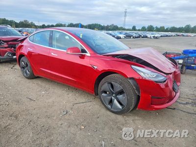Czwarte zdjęcie samochodu z boku: 2018 TESLA MODEL 3 VIN:5YJ3E1EA0JF019351 - miniatura