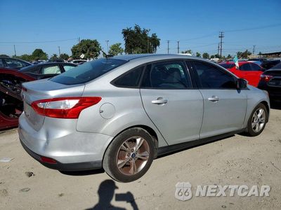 Trzecie zdjęcie samochodu z tyłu: 2014 FORD FOCUS SE VIN:1FADP3F29EL144309 - miniatura