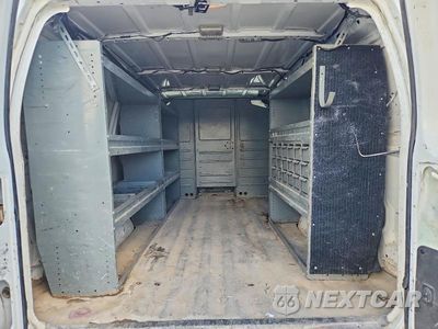 Zdjęcie 10 z 13 samochodu: 2012 FORD ECONOLINE E350 SUPER DUTY VAN VIN:1FTSE3EL2CDB34682 - miniatura