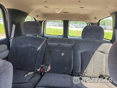 Zdjęcie 10 z 12 samochodu: 2002 CHEVROLET TAHOE C1500 VIN:1GNEC13V52R315327 - miniatura
