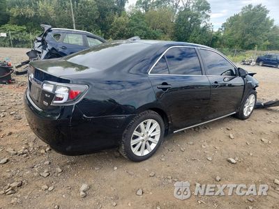 Trzecie zdjęcie samochodu z tyłu: 2012 TOYOTA CAMRY HYBRID XLE VIN:4T1BD1FK0CU008863 - miniatura