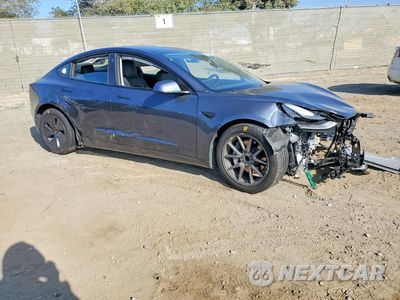 Czwarte zdjęcie samochodu z boku: 2021 TESLA MODEL 3 VIN:5YJ3E1EA1MF940076 - miniatura