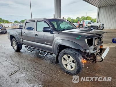 Czwarte zdjęcie samochodu z boku: 2011 TOYOTA TACOMA DOUBLE CAB LONG BED VIN:5TFMU4FN2BX001466 - miniatura
