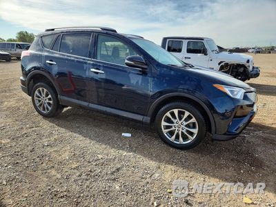 Czwarte zdjęcie samochodu z boku: 2018 TOYOTA RAV4 LIMITED VIN:JTMDFREV0JD250485 - miniatura