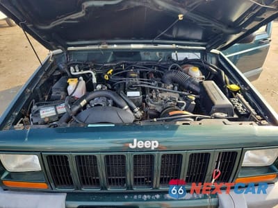 Zdjęcie 12 z 13 samochodu: 2000 JEEP CHEROKEE SPORT VIN:1J4FF48S0YL164357 - miniatura