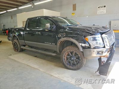 Czwarte zdjęcie samochodu z boku: 2018 NISSAN TITAN XD PLATINUM RESERVE VIN:1N6BA1F44JN524291 - miniatura