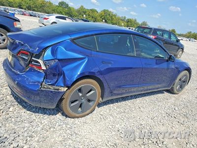 Trzecie zdjęcie samochodu z tyłu: 2023 TESLA MODEL 3 VIN:5YJ3E1EAXPF543454 - miniatura