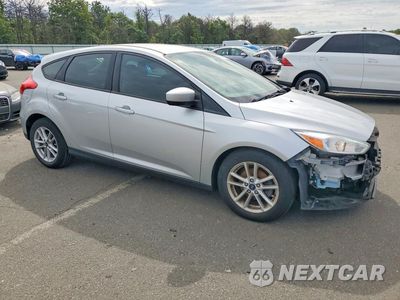 Czwarte zdjęcie samochodu z boku: 2018 FORD FOCUS SE VIN:1FADP3K25JL329389 - miniatura