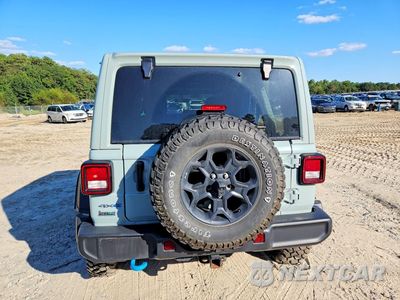 Zdjęcie 6 z 13 samochodu: 2023 JEEP WRANGLER 4XE VIN:1C4JJXN68PW649060 - miniatura
