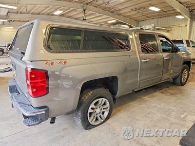 Trzecie zdjęcie samochodu z tyłu: 2017 CHEVROLET SILVERADO K1500 LT VIN:1GCUKREC2HF147660 - miniatura