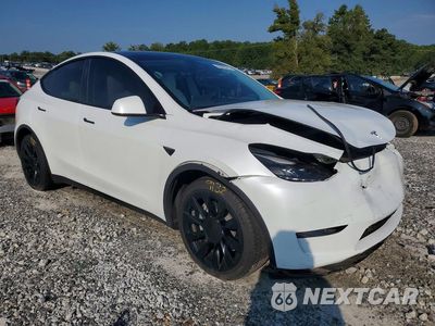 Czwarte zdjęcie samochodu z boku: 2024 TESLA MODEL Y VIN:7SAYGDEE1RA274834 - miniatura