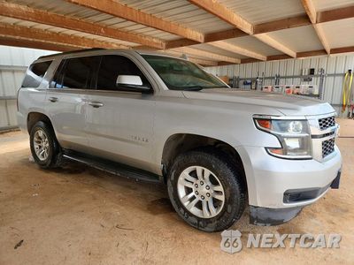 Czwarte zdjęcie samochodu z boku: 2016 CHEVROLET TAHOE C1500 LS VIN:1GNSCAKC0GR375770 - miniatura