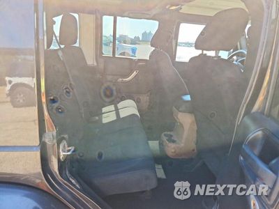 Zdjęcie 10 z 12 samochodu: 2013 JEEP WRANGLER UNLIMITED SAHARA VIN:1C4BJWEG8DL668129 - miniatura