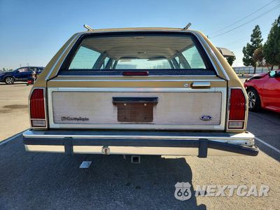 Zdjęcie 6 z 12 samochodu: 1991 FORD CROWN VICTORIA COUNTRY SQUIRE LX VIN:2FACP79FXMX149215 - miniatura