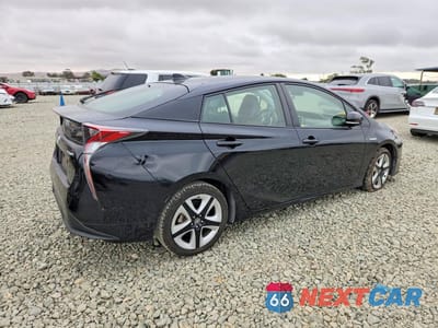 Trzecie zdjęcie samochodu z tyłu: 2016 TOYOTA PRIUS THREE TOURING VIN:JTDKARFU4G3022077 - miniatura