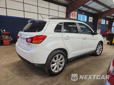 Trzecie zdjęcie samochodu z tyłu: 2015 MITSUBISHI OUTLANDER SPORT SE VIN:4A4AP4AU4FE047772 - miniatura