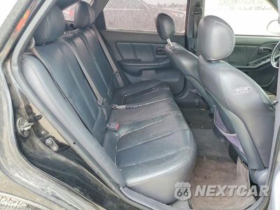 Zdjęcie 10 z 12 samochodu: 2003 HYUNDAI ELANTRA GT VIN:KMHDN55D33U096212 - miniatura
