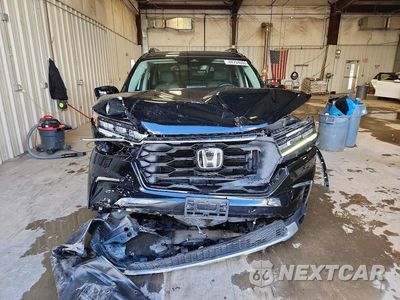 Piąte zdjęcie samochodu w środku: 2024 HONDA PILOT TOURING VIN:5FNYG1H73RB036625 - miniatura