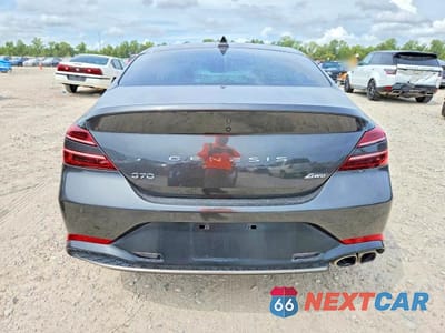Zdjęcie 6 z 12 samochodu: 2023 GENESIS G70 2.0T VIN:KMTG34TAXPU108549 - miniatura