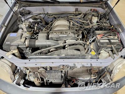 Zdjęcie 11 z 12 samochodu: 2000 TOYOTA TUNDRA SR5 VIN:5TBBT4411YS033620 - miniatura