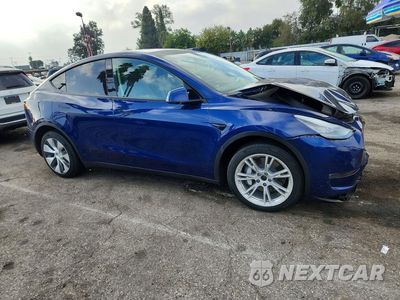 Czwarte zdjęcie samochodu z boku: 2021 TESLA MODEL Y VIN:5YJYGDEE4MF153630 - miniatura