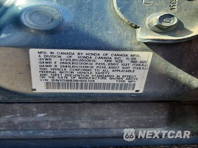 Zdjęcie 13 z 13 samochodu: 2006 ACURA MDX TOURING VIN:2HNYD18826H512705 - miniatura