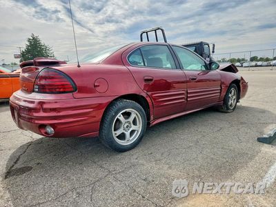 Trzecie zdjęcie samochodu z tyłu: 2002 PONTIAC GRAND AM SE1 VIN:1G2NF52E42M663792 - miniatura