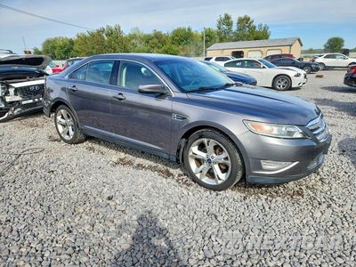 Czwarte zdjęcie samochodu z boku: 2011 FORD TAURUS SHO VIN:1FAHP2KT5BG104209 - miniatura