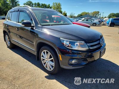 Czwarte zdjęcie samochodu z boku: 2013 VOLKSWAGEN TIGUAN S VIN:WVGBV3AX5DW566452 - miniatura