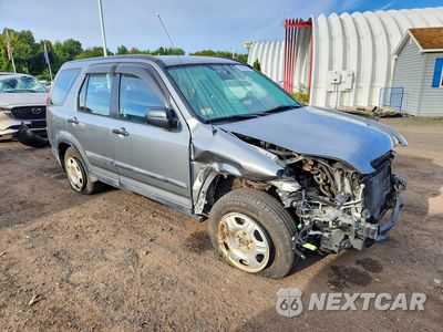 Czwarte zdjęcie samochodu z boku: 2006 HONDA CR-V LX VIN:SHSRD78536U429401 - miniatura