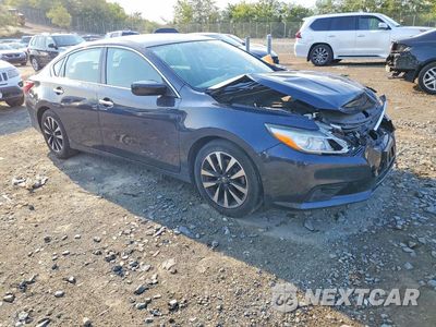 Czwarte zdjęcie samochodu z boku: 2018 NISSAN ALTIMA 2.5 SV VIN:1N4AL3AP7JC101681 - miniatura