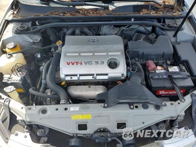 Zdjęcie 11 z 12 samochodu: 2006 TOYOTA CAMRY SOLARA SLE V6 VIN:4T1FA38PX6U066062 - miniatura