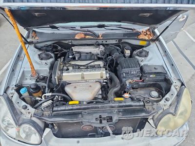 Zdjęcie 11 z 12 samochodu: 2002 HYUNDAI SONATA BASE VIN:KMHWF25S32A681777 - miniatura