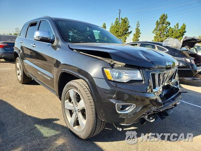 Czwarte zdjęcie samochodu z boku: 2016 JEEP GRAND CHEROKEE OVERLAND VIN:1C4RJECG1GC314503 - miniatura