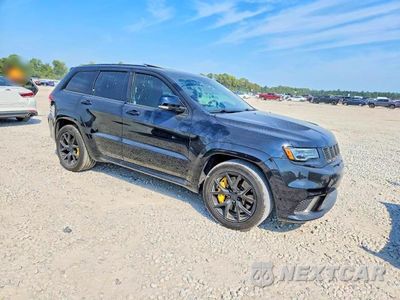 Czwarte zdjęcie samochodu z boku: 2019 JEEP GRAND CHEROKEE TRACKHAWK VIN:1C4RJFN93KC849426 - miniatura