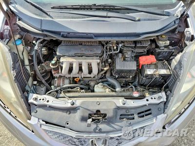 Zdjęcie 11 z 12 samochodu: 2010 HONDA FIT VIN:JHMGE8H20AS007409 - miniatura